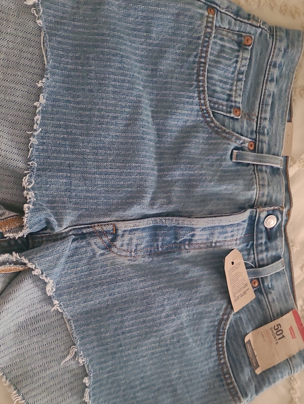 Levi's  Strauss &Co Light Blue Frayed Hem Denim Cutoff Shorts